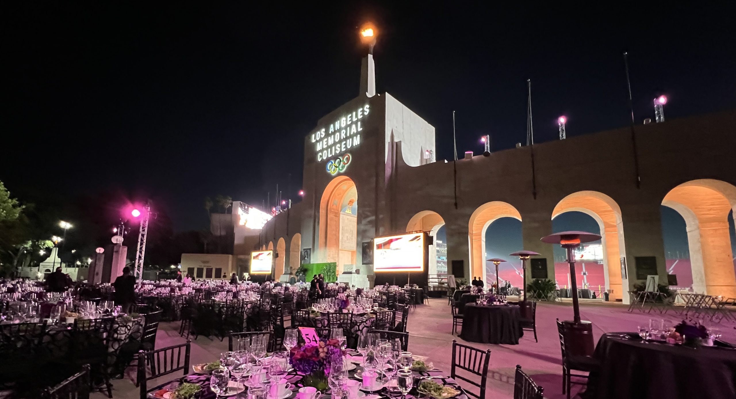 USC Architectural Guild dinner at the illuminated Los Angeles Memorial Coliseum